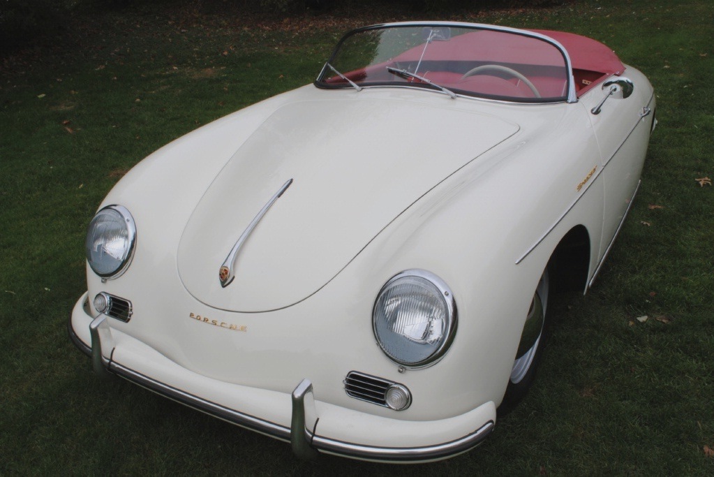 Elegant and authentic 1957 Porsche 356A Speedster with matching numbers, Speedster White finish, red interior, and finely restored detailing.