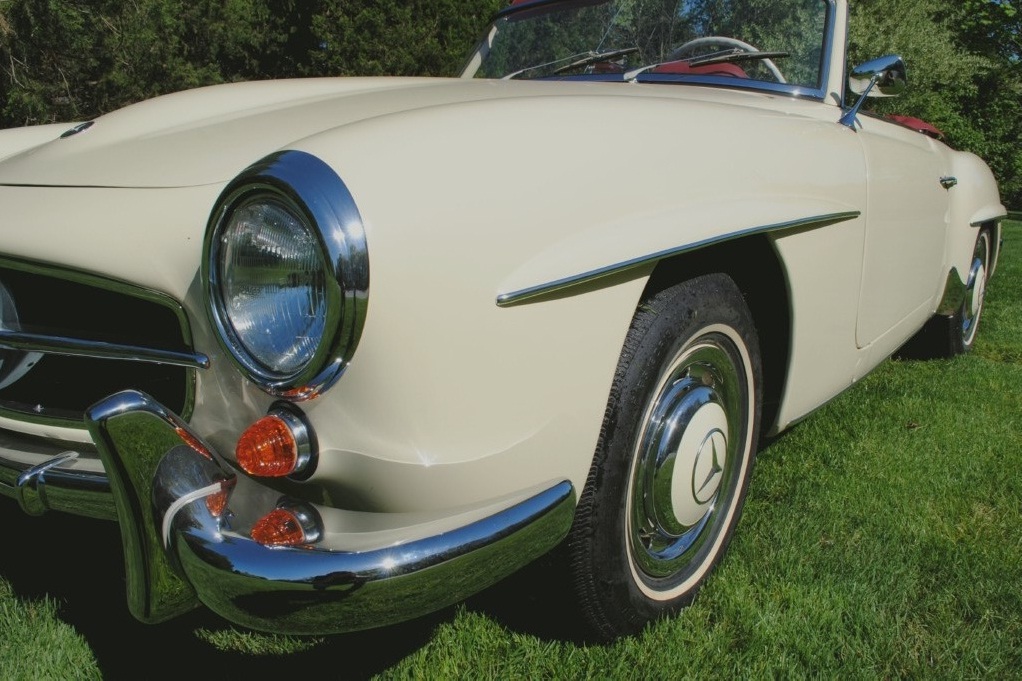 Timeless 1959 Mercedes 190SL Roadster, elegantly restored in DB 608 Ivory, pristine red interior, full drivetrain rebuild, collectible.