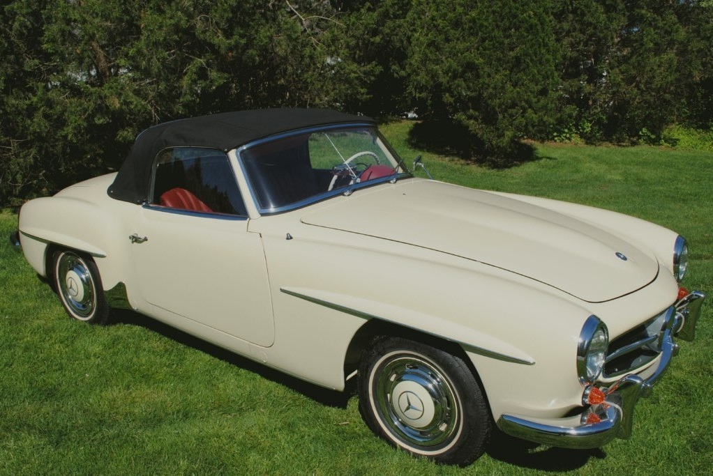 Collector-grade 1959 Mercedes 190SL convertible, expert frame-off restoration, factory Ivory color, rebuilt front end, brakes, and soft top installed.