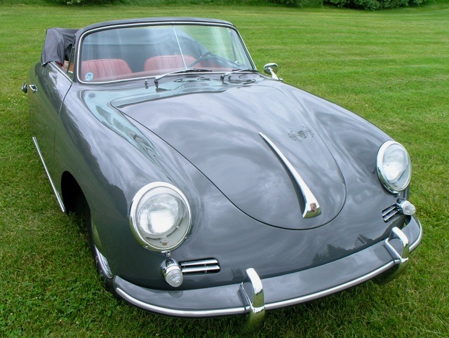 Restored Slate Grey 1961 Porsche 356B Cabriolet convertible with red interior, a classic model maintained for originality and long-term value.