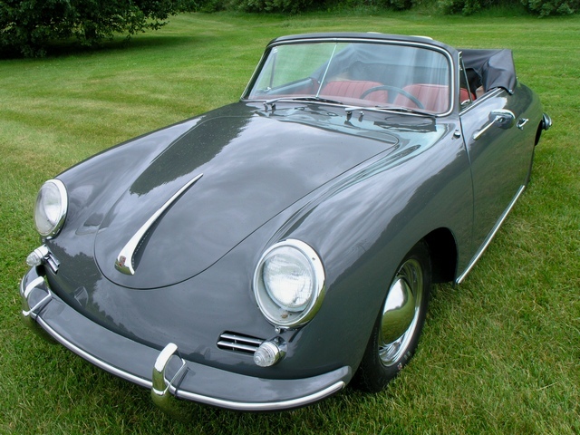 Slate Grey 1961 Porsche 356B Cabriolet convertible with red interior and manual gearbox, restored using period-correct original materials.