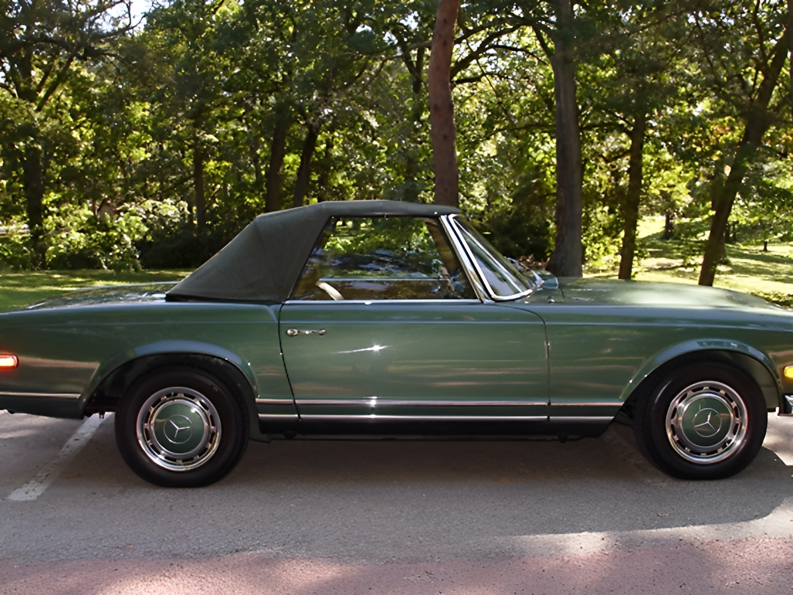 Freshly Tuned Green 1970 Mercedes-benz 280SL Pagoda Convertible Boasting Tan Leather Seats And Seamless Automatic Performance.