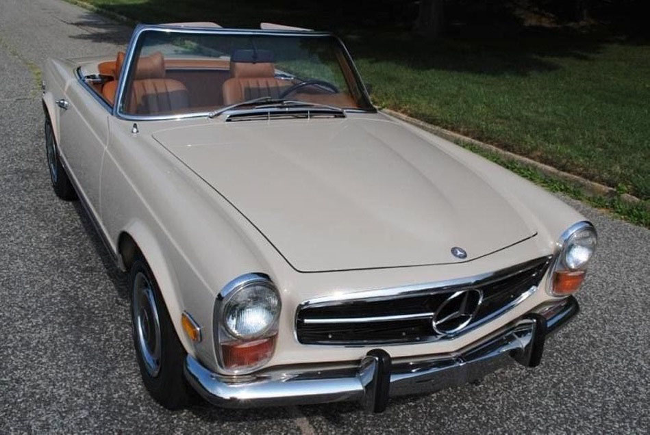 Pristine 1971 Mercedes 280SL convertible in factory finish with correct chrome, dash, and square-weave flooring.