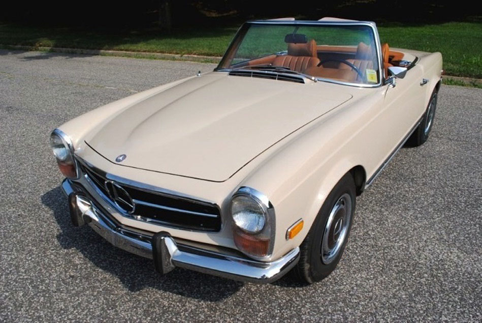 Pristine collector 1971 Mercedes-Benz 280SL in factory Beige with a Cognac leather interior and canvas top fitted.