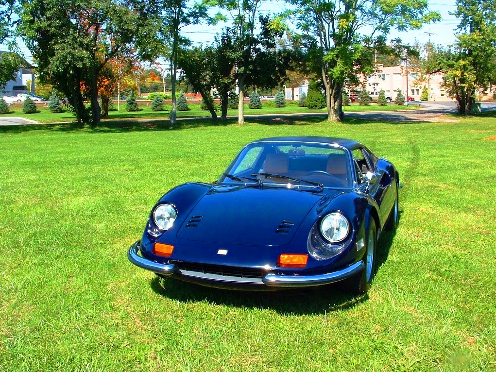 1974 Ferrari 246 GTS Dino convertible in Blue with fresh tan leather, mouse fur dash, and detailed plating of all metalwork.